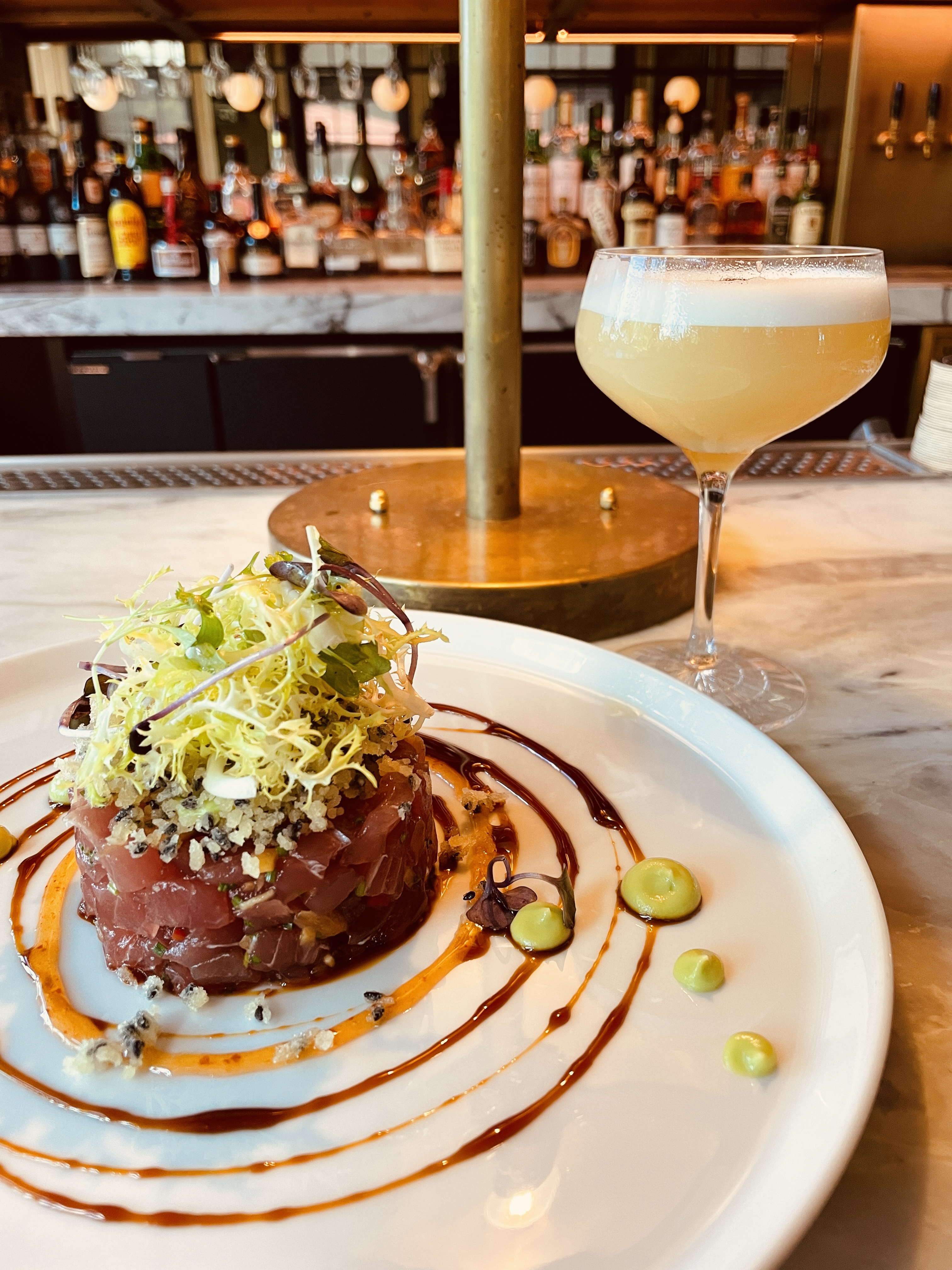 Tuna tartare plated with cocktail